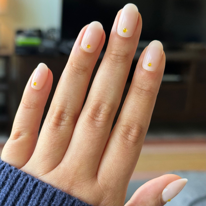 Citrus Studs - Press-On | Short | Round milky neutral manicure with small 3D yellow accents for an easy at-home mani
