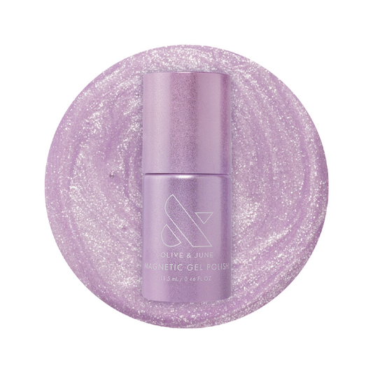 Olive and June Amethyst Velvet - Gel polish bottle on sparkling pastel lavender magnetic gel polish background