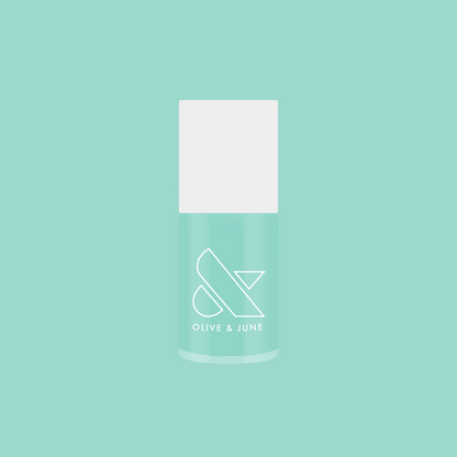 Bottle of All Manis on Deck gel polish in bright blue-green shade against matching background