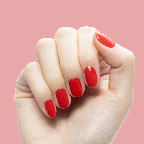 CV - Gel shown on natural nails in a bright cherry red shade for a glossy, long-lasting manicure by Olive and June