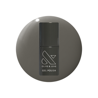 Is It Smoky In Here? Gel polish bottle with deep charcoal gray for a sleek, long-lasting mani by Olive and June