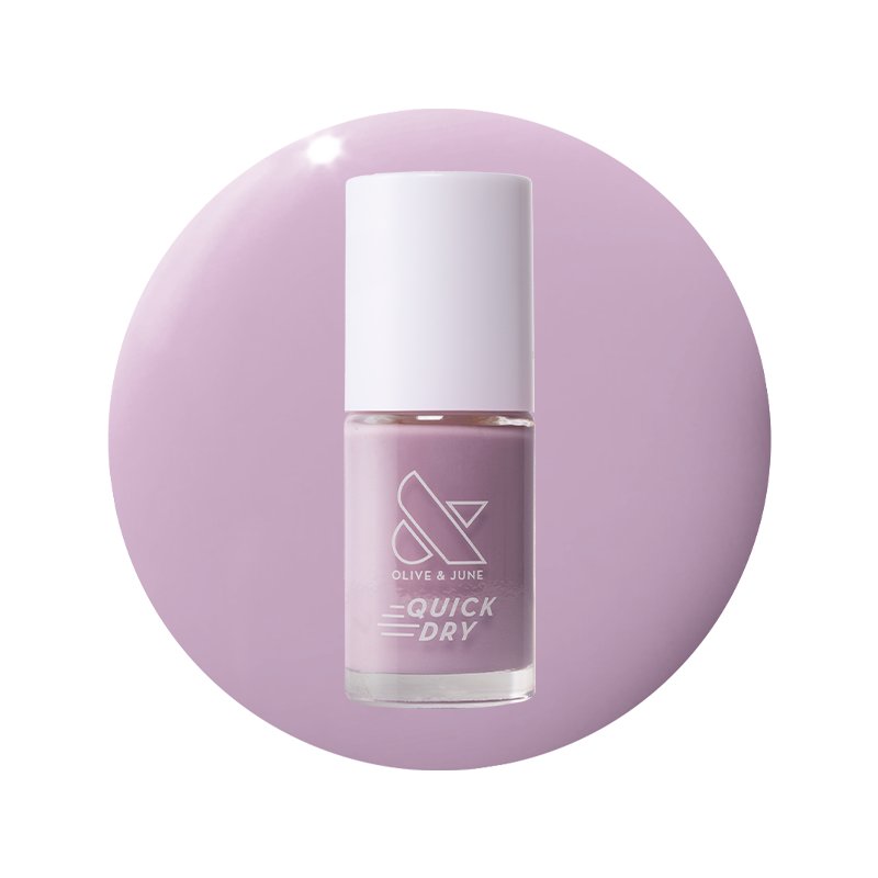 Bottle of Dreamy sheer milky pastel lavender quick dry gel polish on matching circular background for manicure use