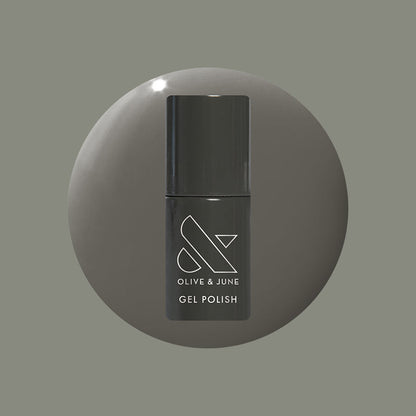 Is It Smoky In Here? Gel polish bottle in deep charcoal gray for a sleek and long-lasting mani by Olive and June