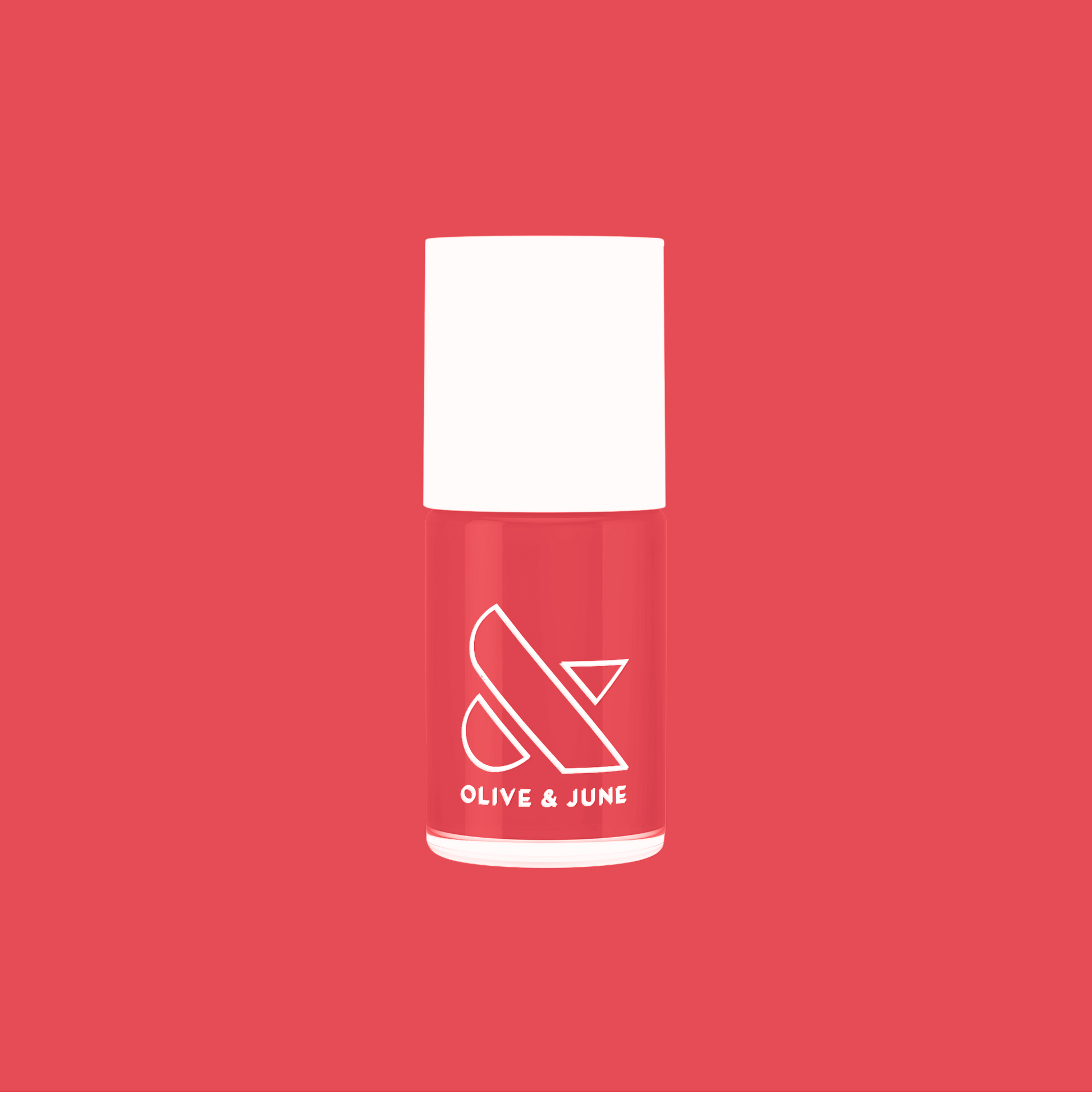 Bottle of Field Day nail polish by Olive and June in juicy watermelon red for vibrant at home mani looks