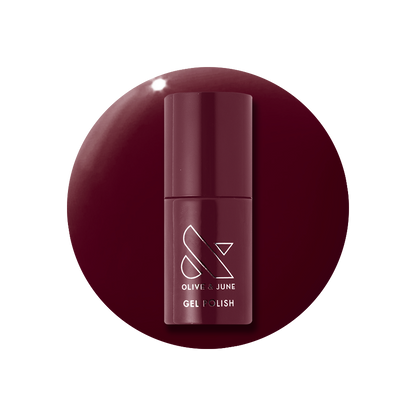 Obsessed - Gel bottle displayed in deep dark ruby red for a rich, long-lasting gel polish manicure by Olive and June