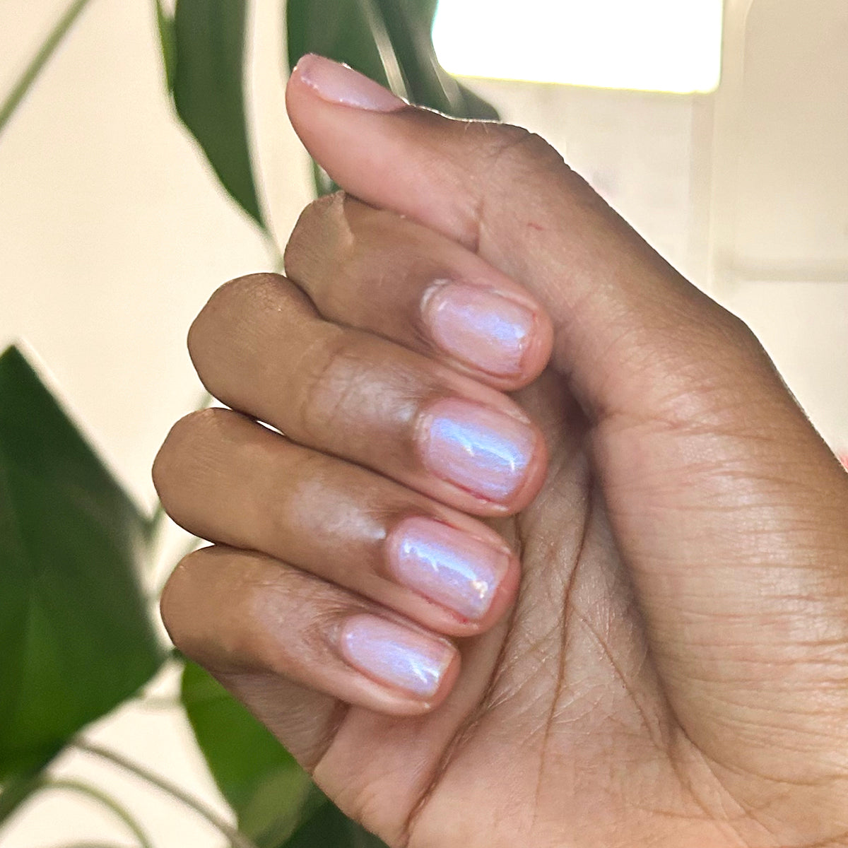 Pink Goldfish - Gel on natural nails with subtle pink iridescent shimmer for a soft manicure by Olive and June