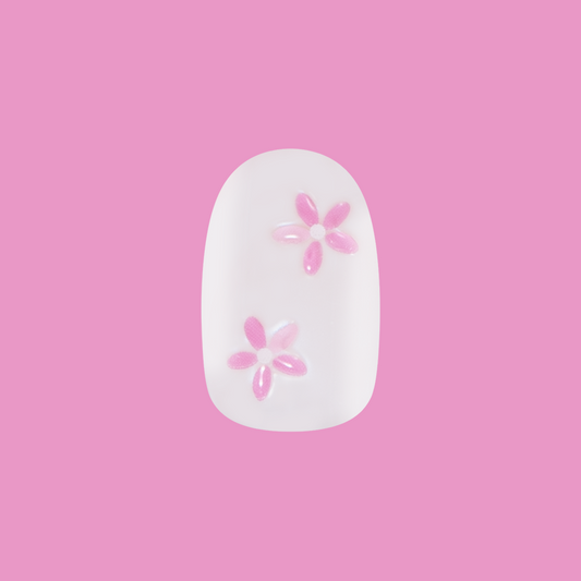 Puffy Petal Iridescent - Press-On | Short | Round sheer nail with iridescent finish and raised pink floral design