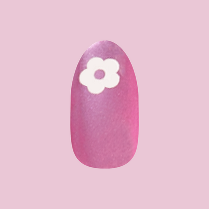 Sparkle Floral - Press-On | Medium | Oval press-on nail with glittery pink polish and white floral detail for a fresh mani look