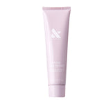 Pink tube of HAND TREATMENT with shea butter and pomegranate for hydrating and renewing dry skin and nails