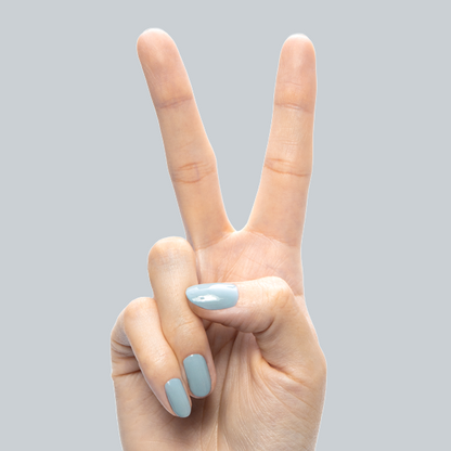 Vintage - Gel polish shown on hand with smooth vintage denim blue nails for a stylish gel manicure by Olive and June